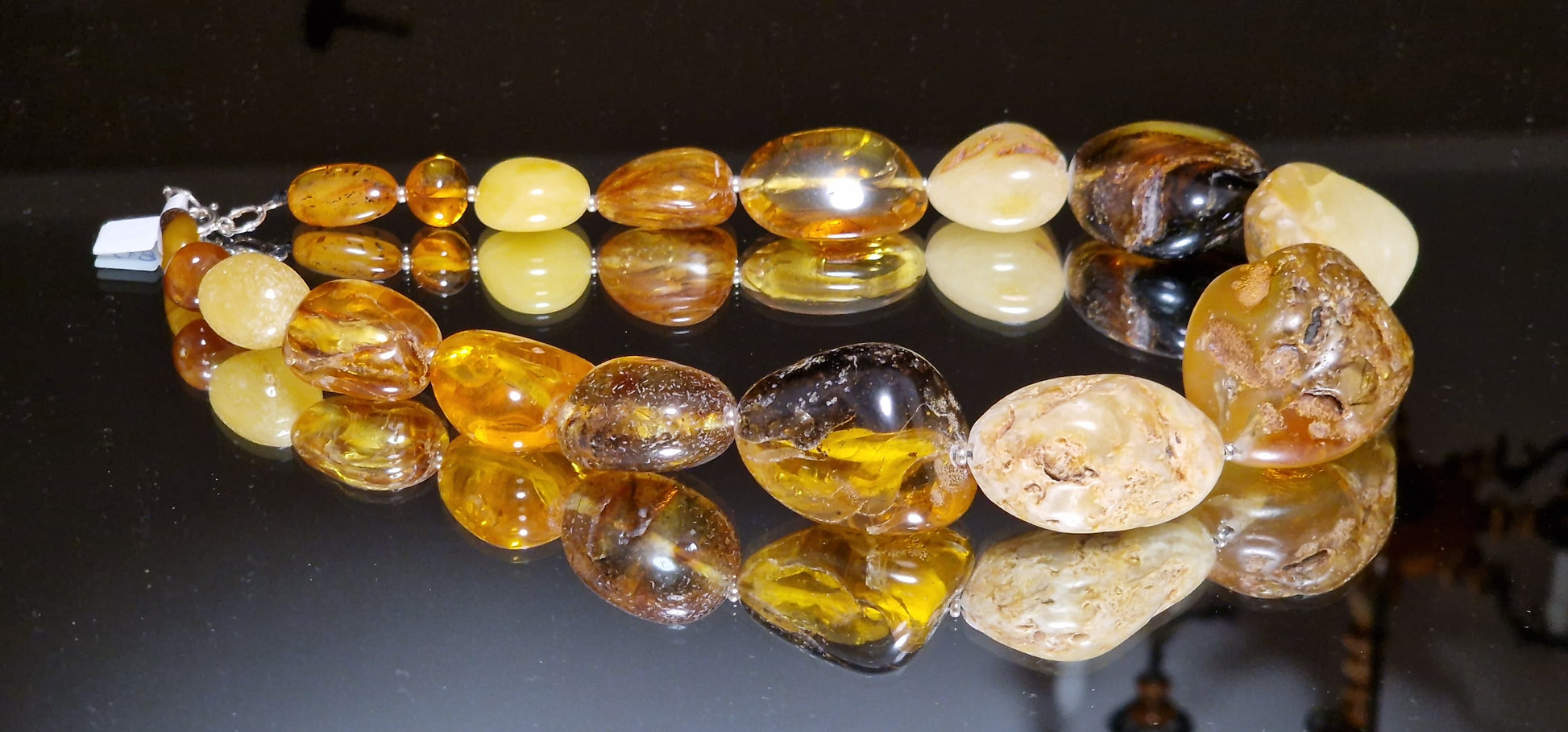 Big Ball Multicolor Amber Necklace is handmade from Natural Baltic Amber  Color: Unique Chalk, Milky Yellow, Clear Yellow-Cognac, with natural Ingrowth and Mosaic, Half Mat  Clasp:&nbsp;Silver Spring Ring  Weight: 164g / 5.78oz