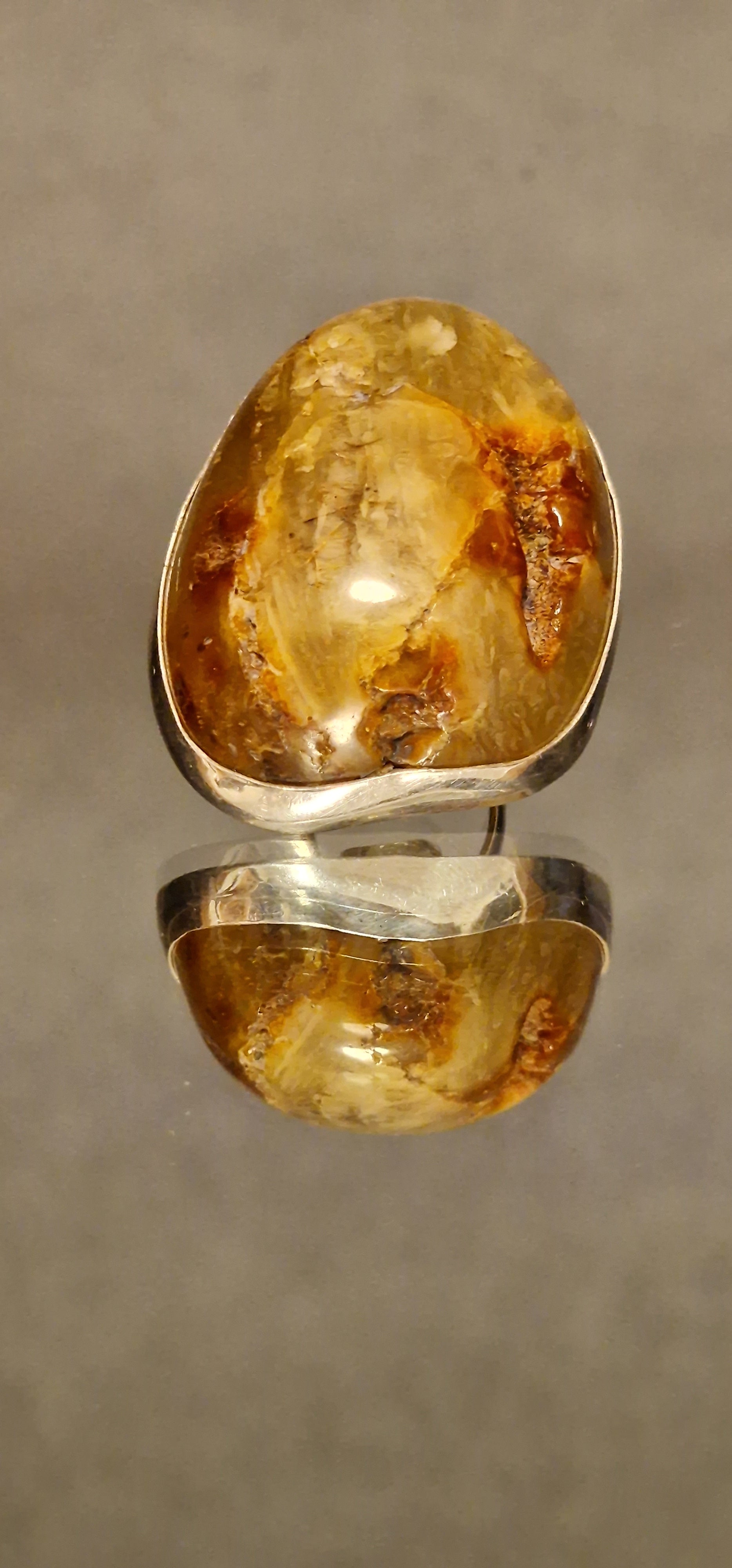 Natural Amber Ring in Solid Silver Natural Baltic Amber Stone Slightly polished with visible bark Foggy mixed White-Green-Brown inclusions Stone Size 5cm x 6cm Size adjustment Handmade