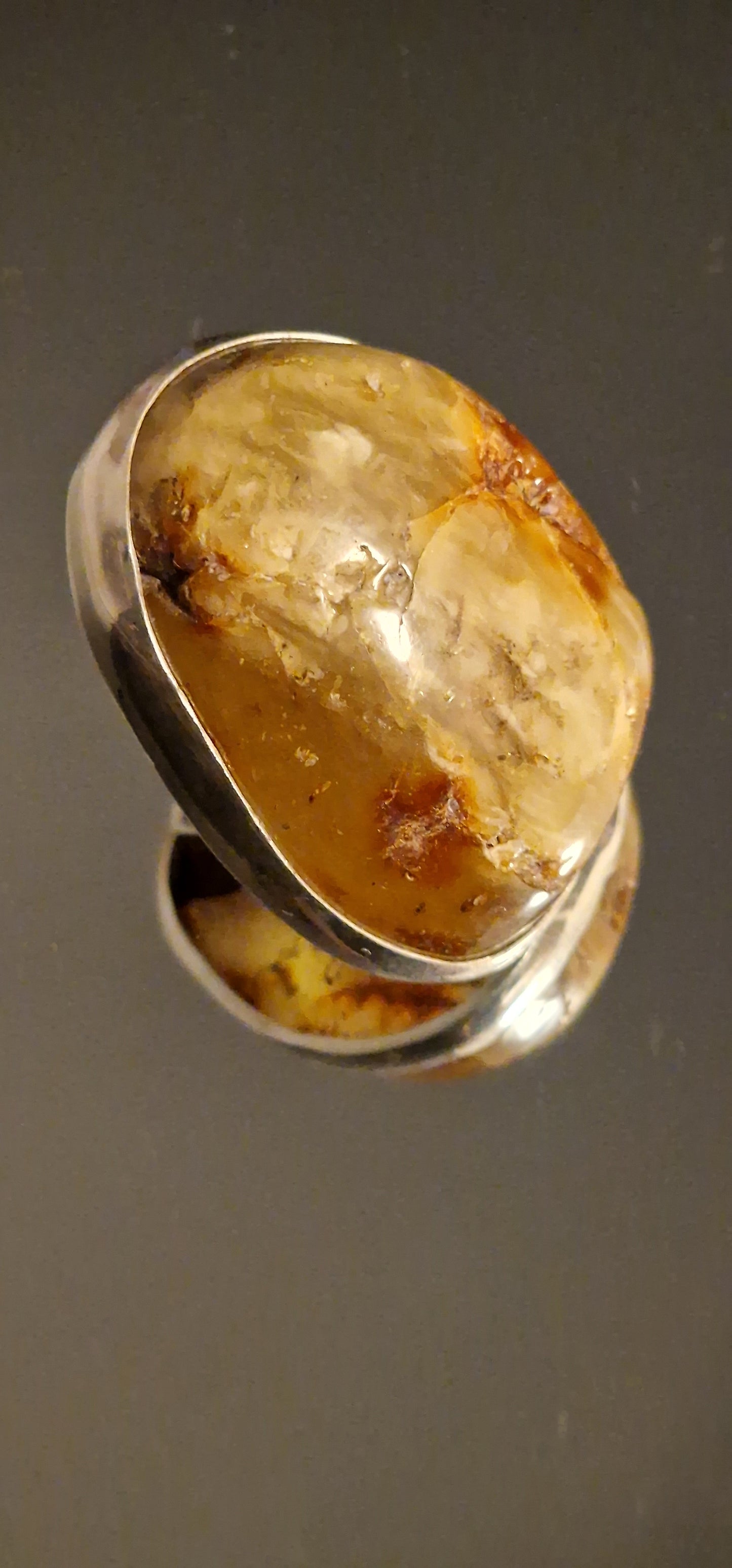 Natural Amber Ring in Solid Silver Natural Baltic Amber Stone Slightly polished with visible bark Foggy mixed White-Green-Brown inclusions Stone Size 5cm x 6cm Size adjustment Handmade