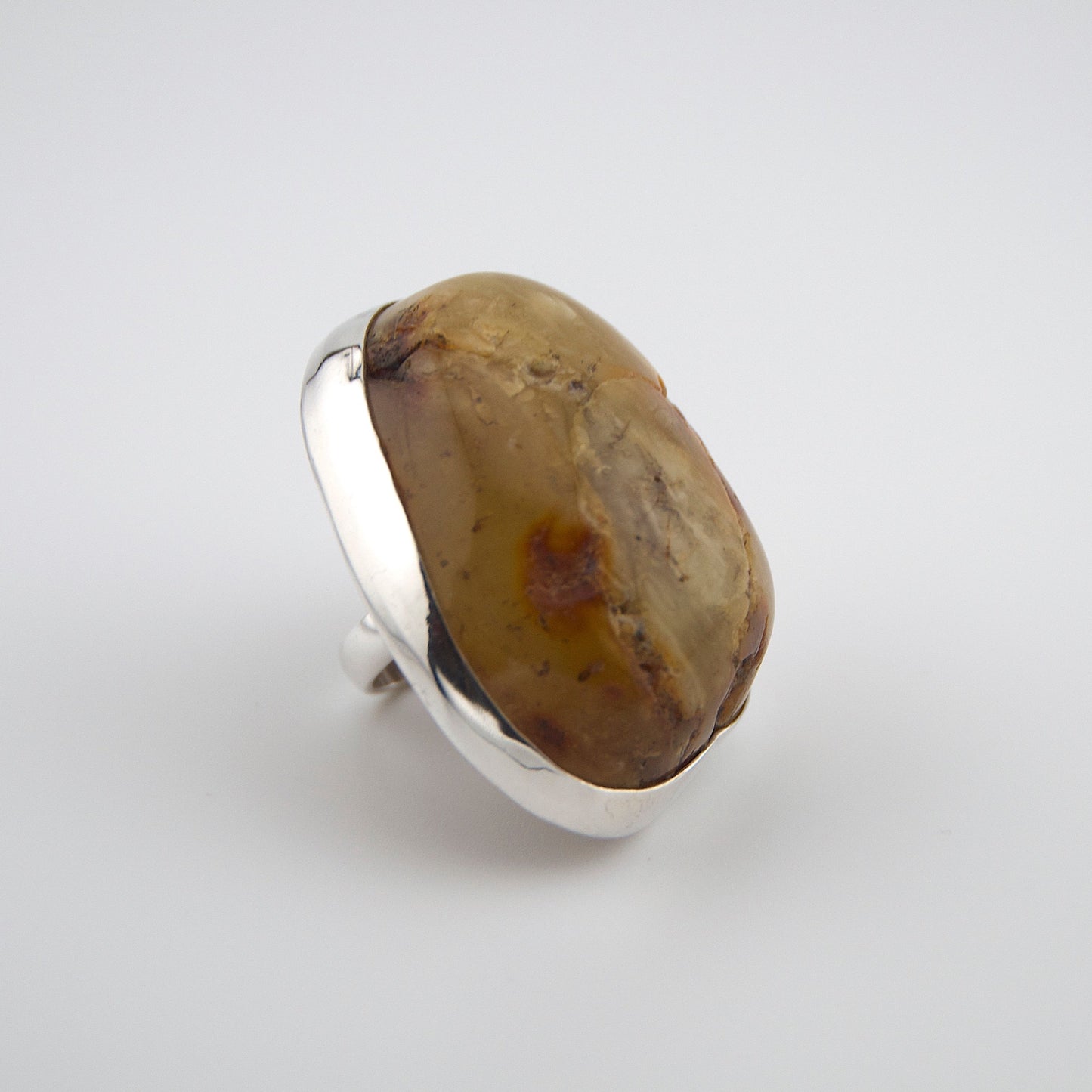 Natural Amber Ring in Solid Silver Natural Baltic Amber Stone Slightly polished with visible bark Foggy mixed White-Green-Brown inclusions Stone Size 5cm x 6cm Size adjustment Handmade